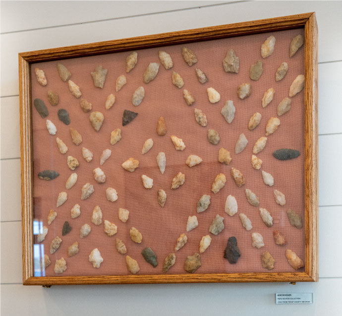 A collection of Native American arrowheads on display at Oakfuskee Conservation Center.