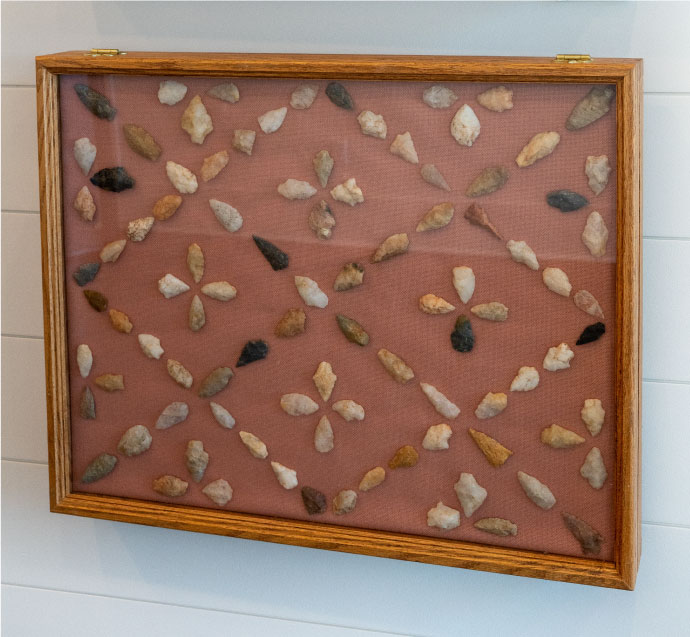 A collection of Native American arrowheads on display at Oakfuskee Conservation Center.